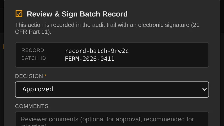 The review-and-sign dialog for a completed batch record, its decision recorded in the audit trail with an electronic signature under 21 CFR Part 11.